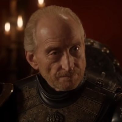 The picture shows Charles Dance looking at something with an serious look on the face.